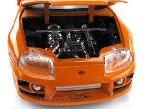 "Fast & Furious" Brian's Toyota Supra w/ Figure 1:24 Scale - Jada Diecast Model Car (Orange)